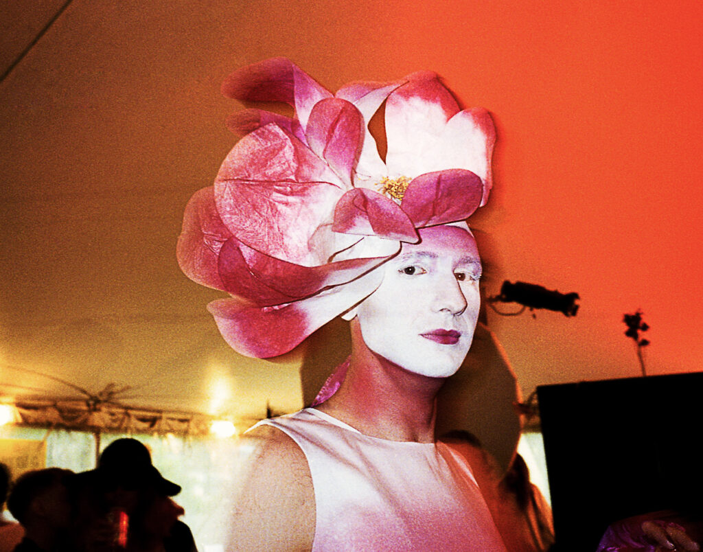 Drag queen with flower hat, Bushwick